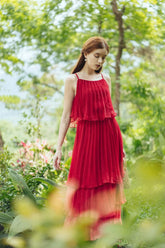 Tiered pleated organza midi dress with spaghetti straps and flared layered silhouette